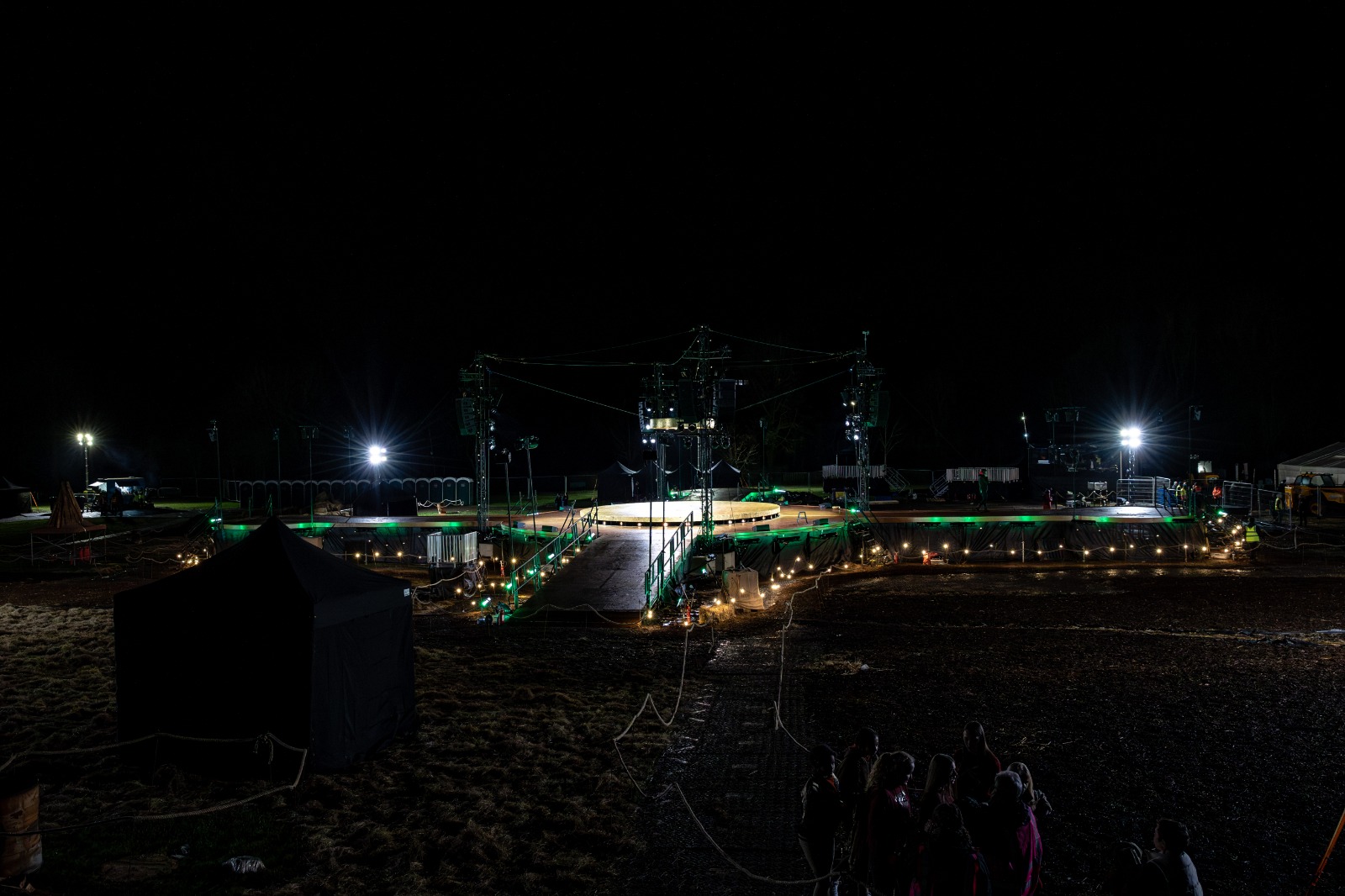 Brighter Still — wide shot of circular stage in outdoor field at night, Bradford 2025