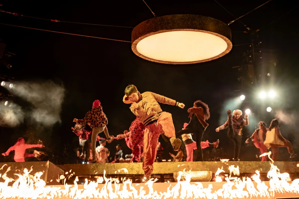 Brighter Still closing ceremony — live performance with fire effects and dancers on stage, Bradford 2025