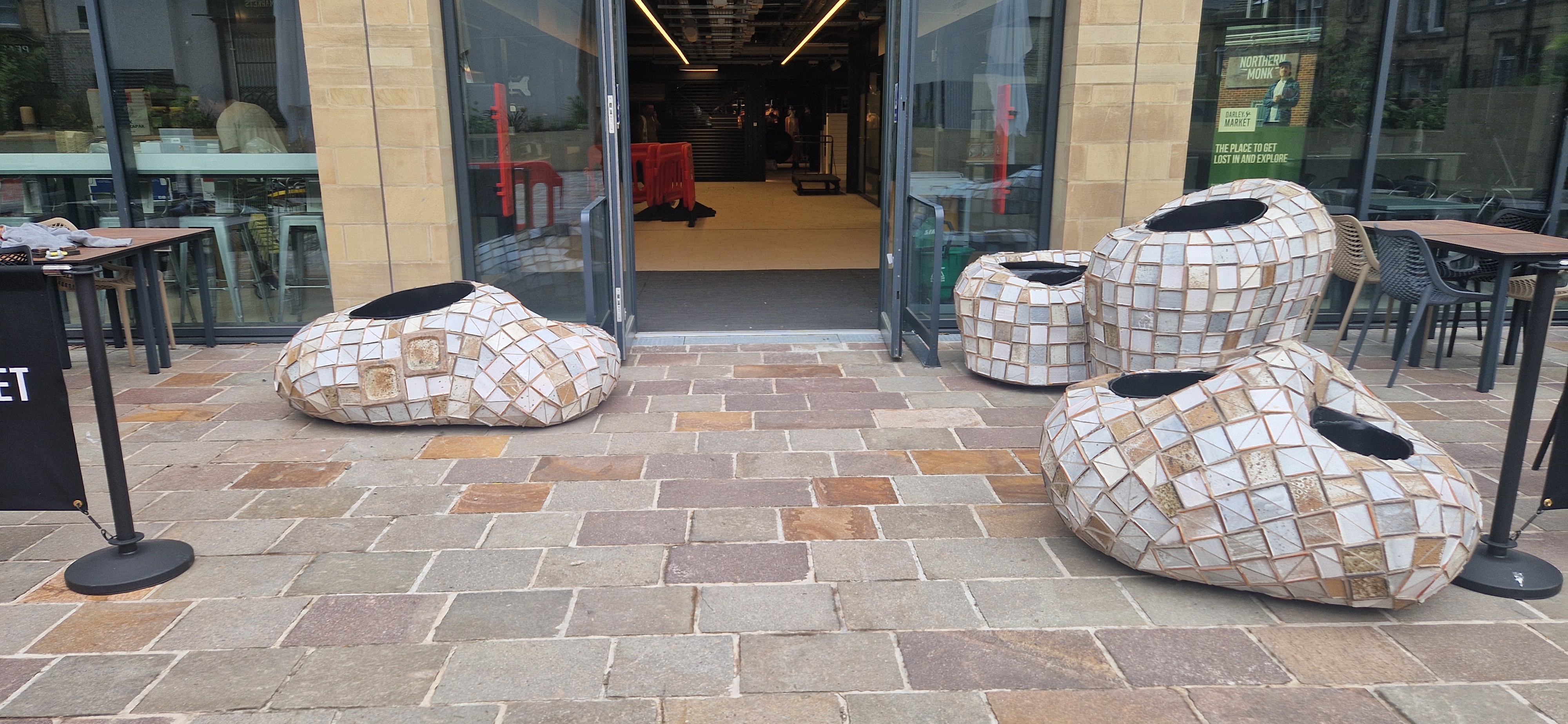 Signs of the Times — finished Fritz Stella ceramic tile planters installed in Darley Street Market courtyard