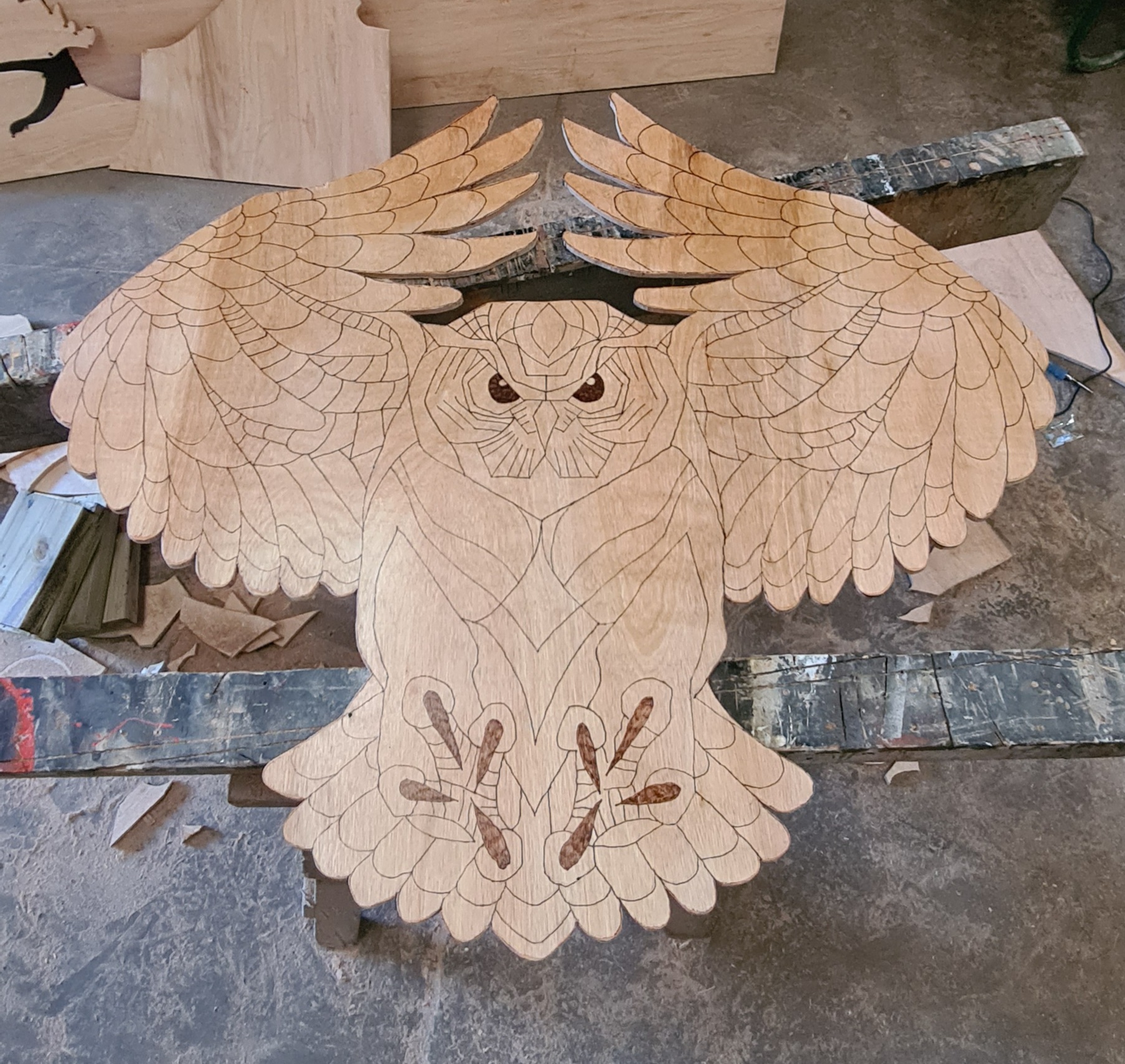 Summer Garden — bespoke hand-cut decorative owl, produced in-house by Raven Staging as part of the project