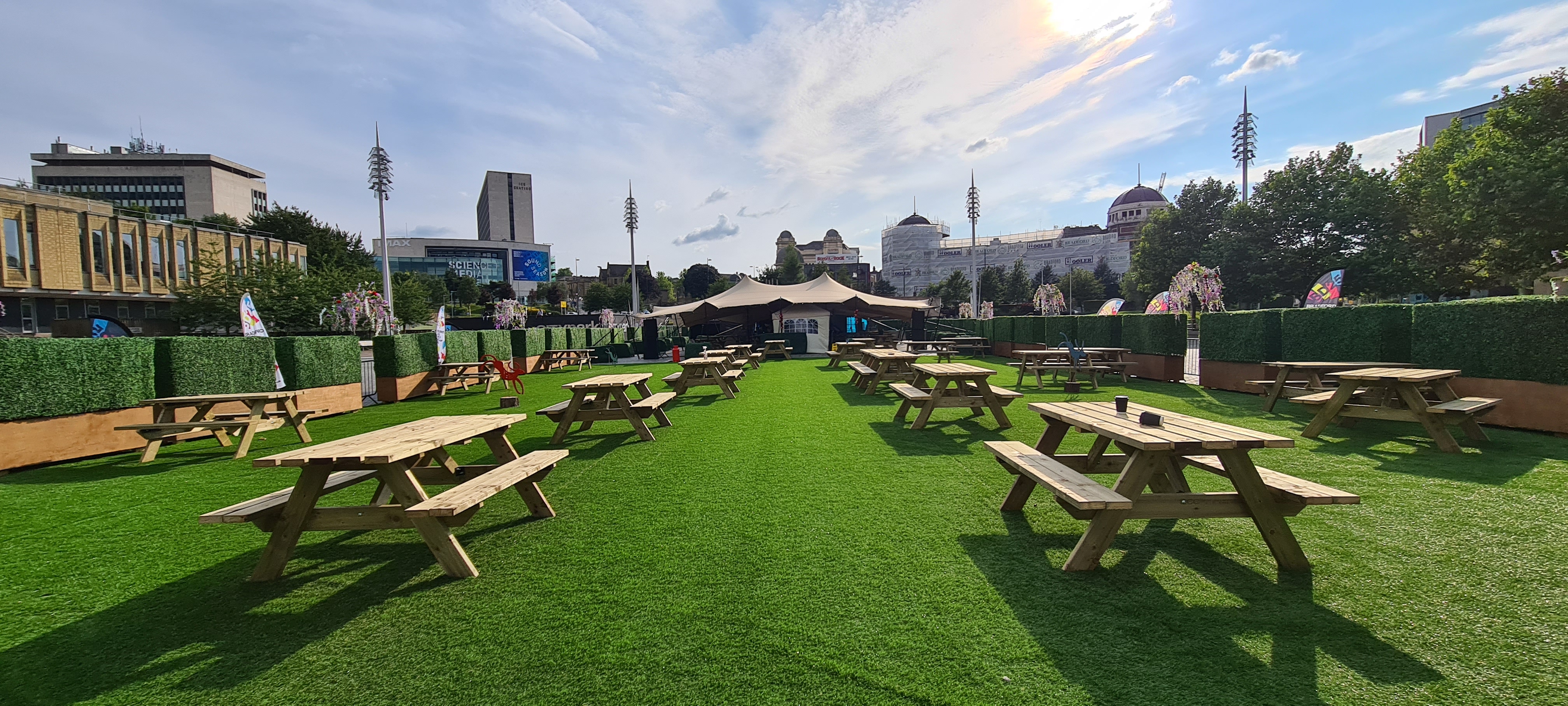 Bradford Summer Garden — 40 picnic benches and box hedge planters in full use at Bradford city centre event space